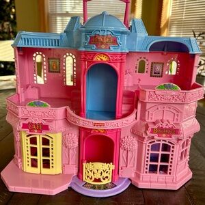 Vintage 2001 Fisher-Price Sweet Streets Victorian Hotel dollhouse playset.